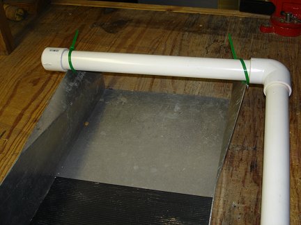 The spraybar on the recirculating sluice.