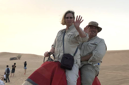 Leslie and I Camel riding in the arabian desert.