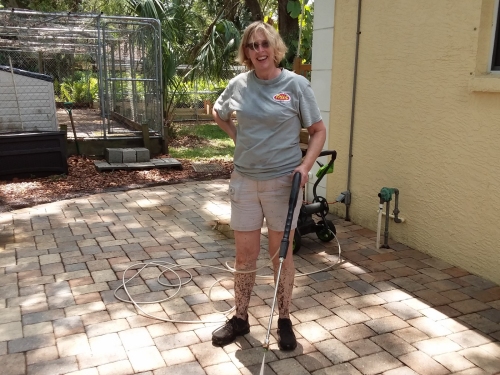 Leslie dirty from pressure washing.