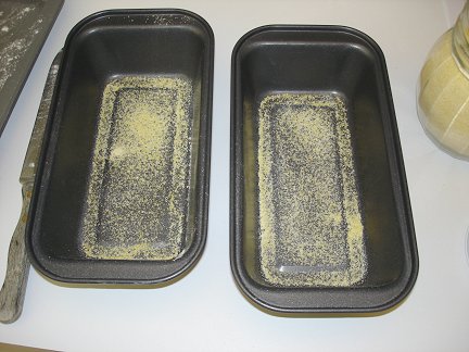Sprinkle a little corn meal in your loaf pans