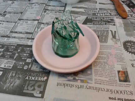 A broken glass ready to be melted.