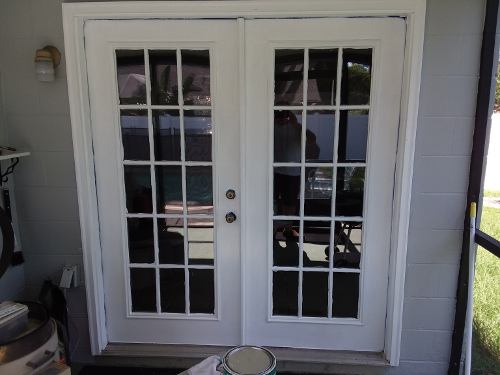 The French Doors to the back porch have been painted.