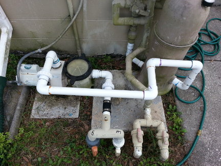 Poorly plumbed pool piping.
