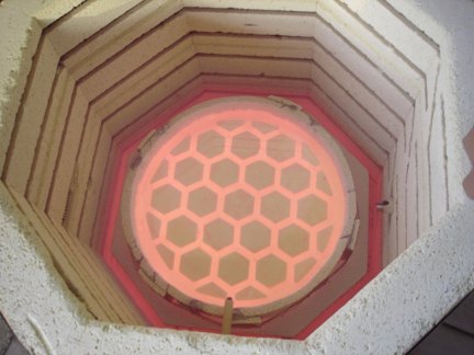 The 12.5 in hexagonal-back, honeycomb mirror in the kiln.