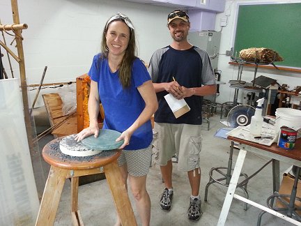 Joey and Brent Hilker rough grinding their telescope mirror.