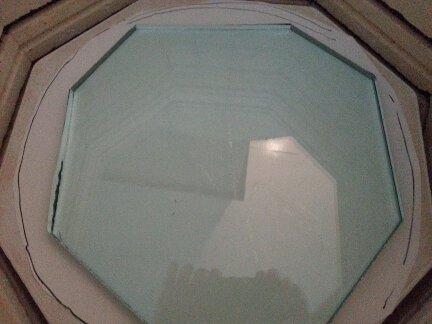 The first piece of glass is in the kiln.