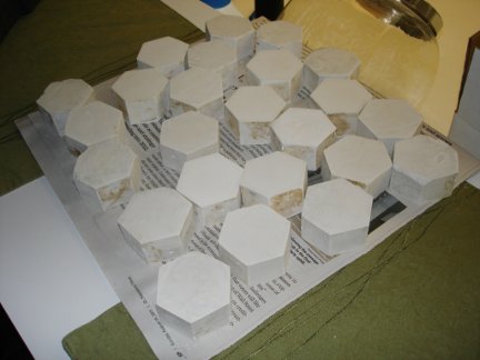 A lot of completed plaster hexagons.