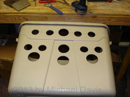 Air inlet holes cut into the tote.