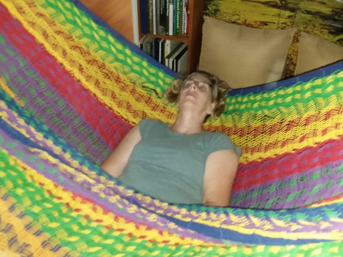 Leslie laying in her hammock.