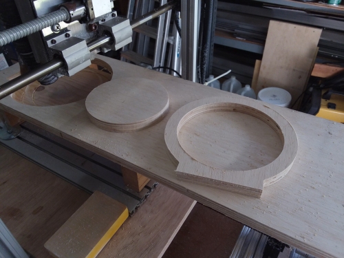 Cutting telescope rings on my CNC router.