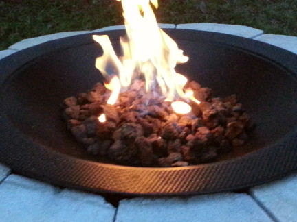 Closeup of the fire pit burning.