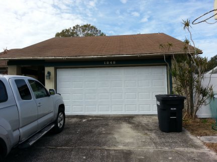 The newly painted garage door.