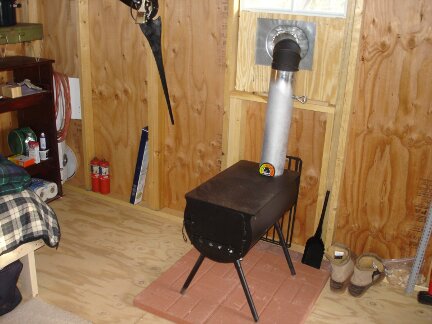 The wood burning stove in the cabin.