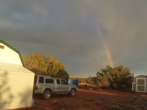 a rainbow over our Arizona ranch.