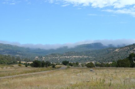 Fog and clouds rolling over Bartlett Mesa.